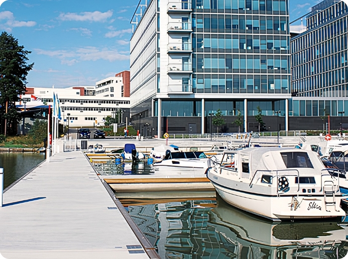Concrete floating walkway dock at a marina