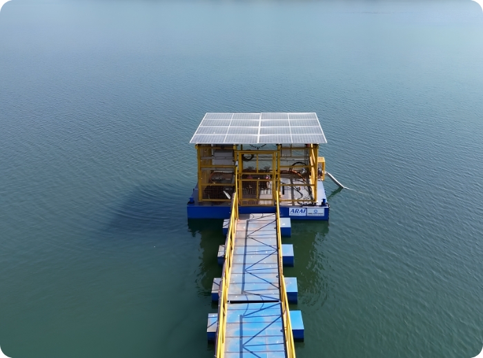 Floating solar panel array on reservoir water