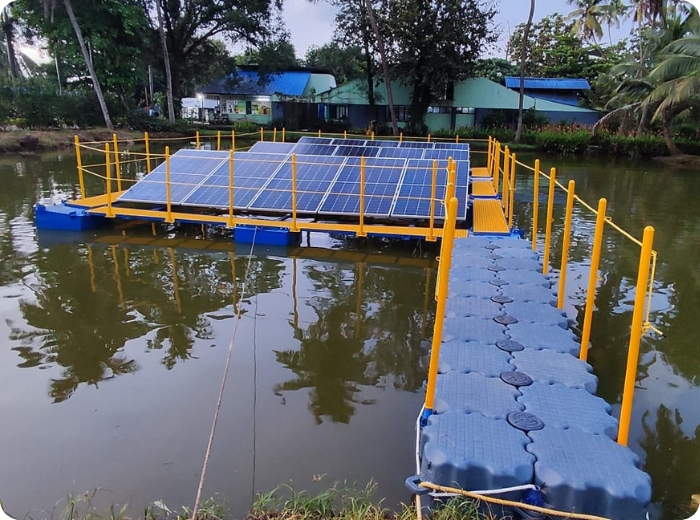 Floating solar panel array on reservoir
